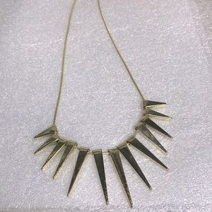 Express gold tone chest piece necklace